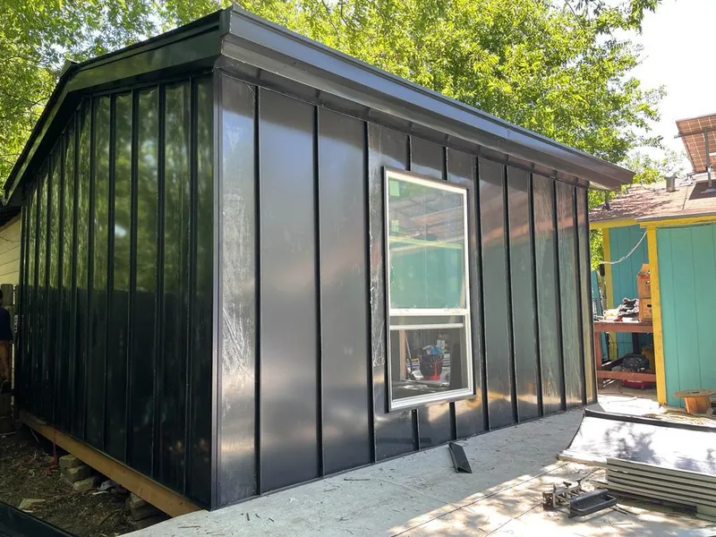 Black standing seam metal wall panels for Metal Roof Installation in Okmulgee