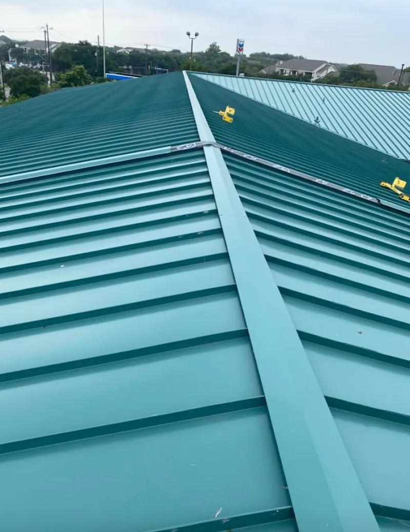 Green commercial metal roof ridge and valley for Metal Roof Repair in Okmulgee